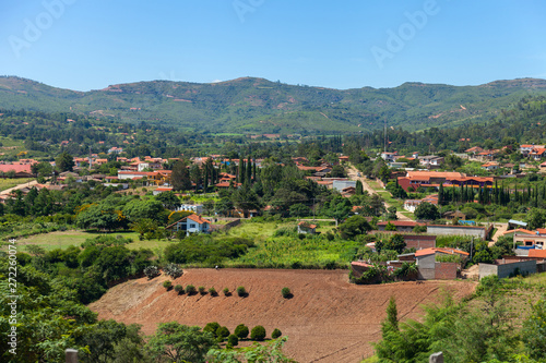 Panoramic view of picturesque village in a valley in the midst of hills and mountains. Samaipata, Bolivia photo