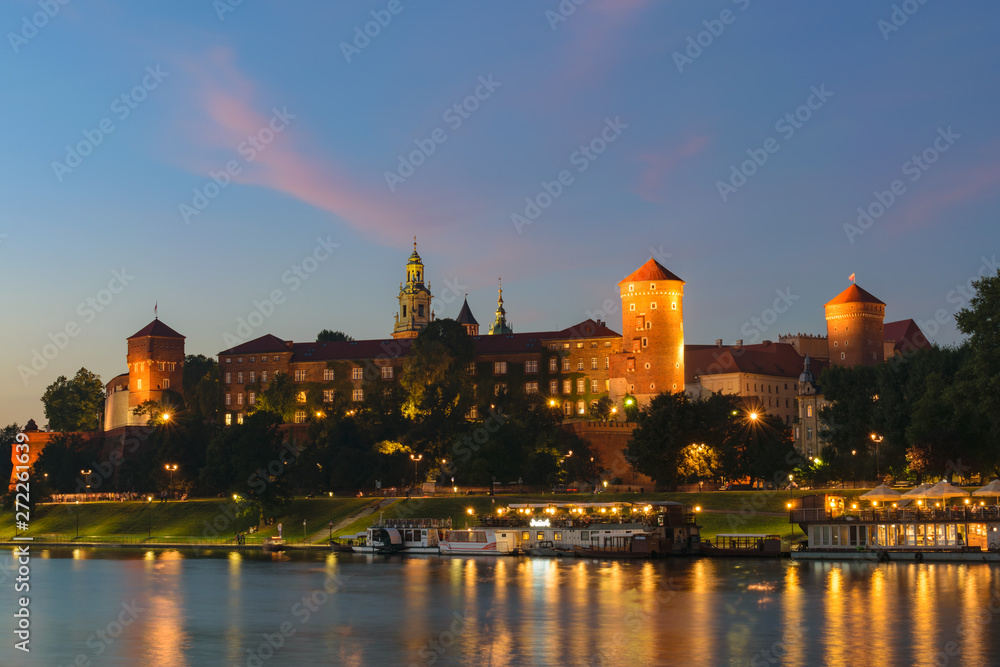 Wawel royal castle view from across the river Vistula (Wisla) at sunset