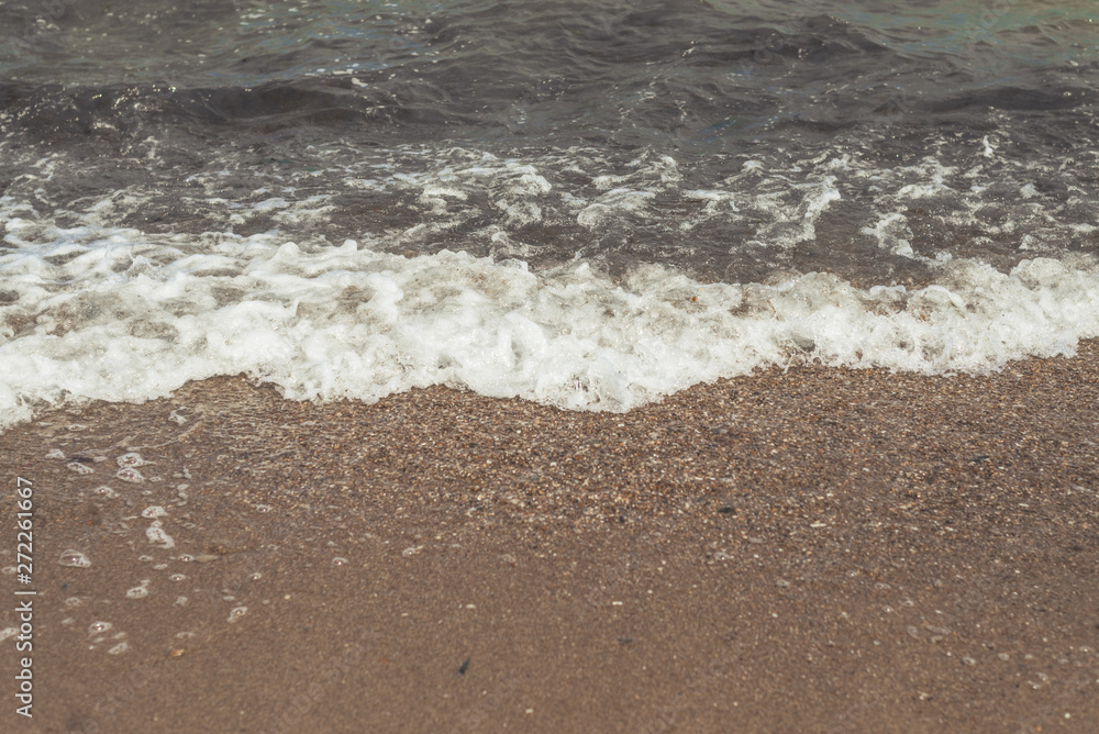 Waves on the sea, ocean. View of the sea from the shore in the afternoon in summer. Waves on the sea, ocean. View of the sea from the shore in the afternoon in summer.