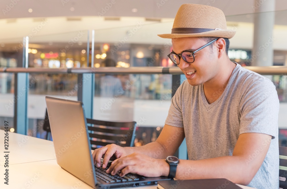 Asian businessman planning projects using laptop,startup business concept. Asian businessman planning projects using laptop,startup business concept.