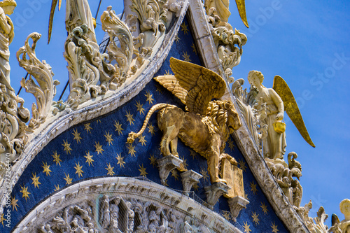 Lion of St Mark, symbol of imperial Venice on the Basilica San Marco in Italy