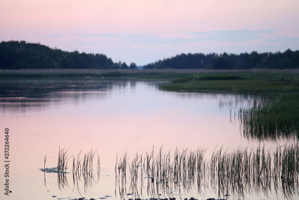 Obraz premium Sunset sea shore landscape. City sea shore sunset panorama. Sunset city sea shore view. Sunset sea shore panorama