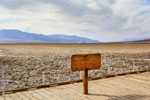 Badwater Basin in the Death Valley National Park in USA, at elevation of 85.5 meters below sea level. photo