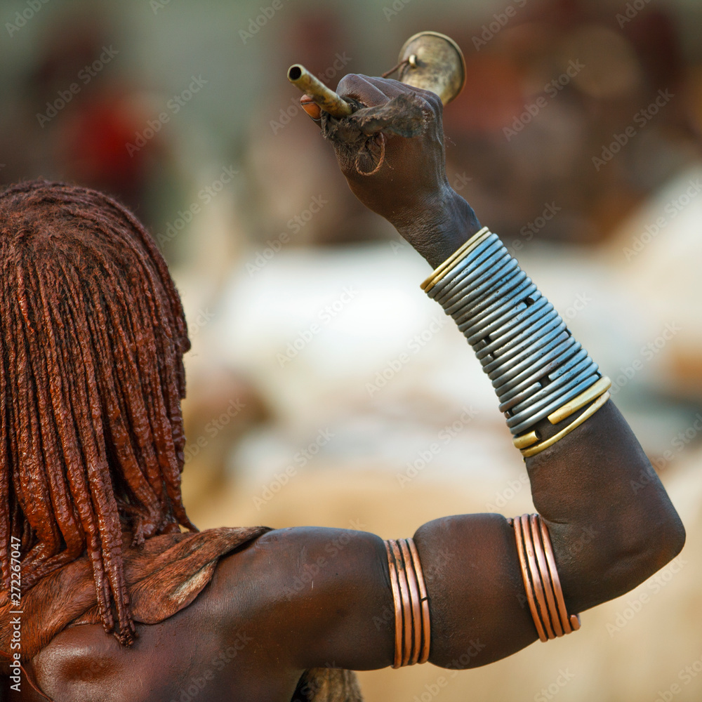 Hamar tribe woman asking to be whipped during bull jumping ceremony ...