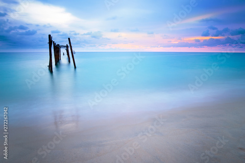 Quadro em tela Decay bridge reflection in smooth sea surface