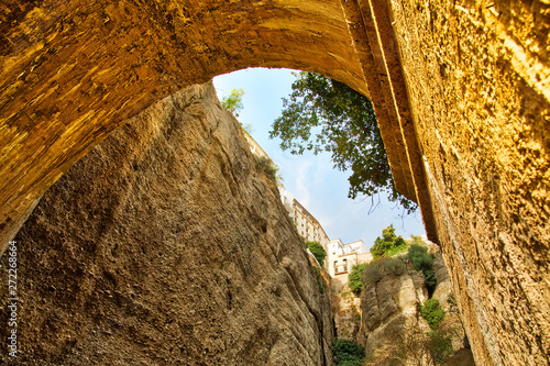 Famous Puente Nuevo Bridge's Arch in Ronda historic city center