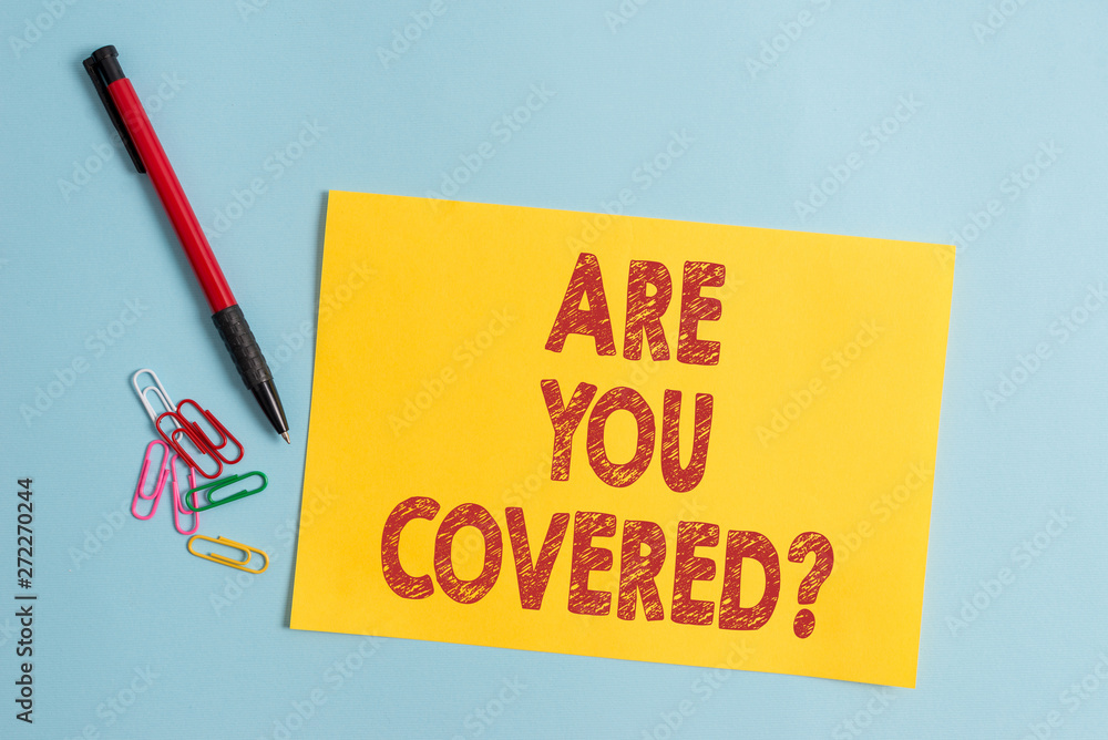 Handwriting text Are You Covered Question. Conceptual photo asking showing if they had insurance in work or life Plain cardboard and writing equipment placed above pastel colour backdrop Handwriting text Are You Covered Question. Conceptual photo asking showing if they had insurance in work or life Plain cardboard and writing equipment placed above pastel colour backdrop