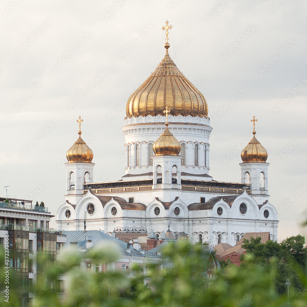 white stone Cathedral of Christ the Saviour with golden domes