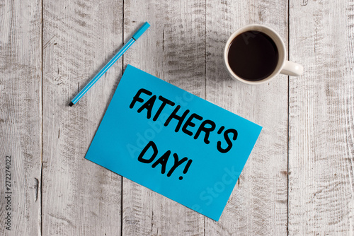 Conceptual hand writing showing Father S Day. Concept meaning day of year where fathers are particularly honoured by children Pastel Colour paper and pen with coffee cup on wooden table