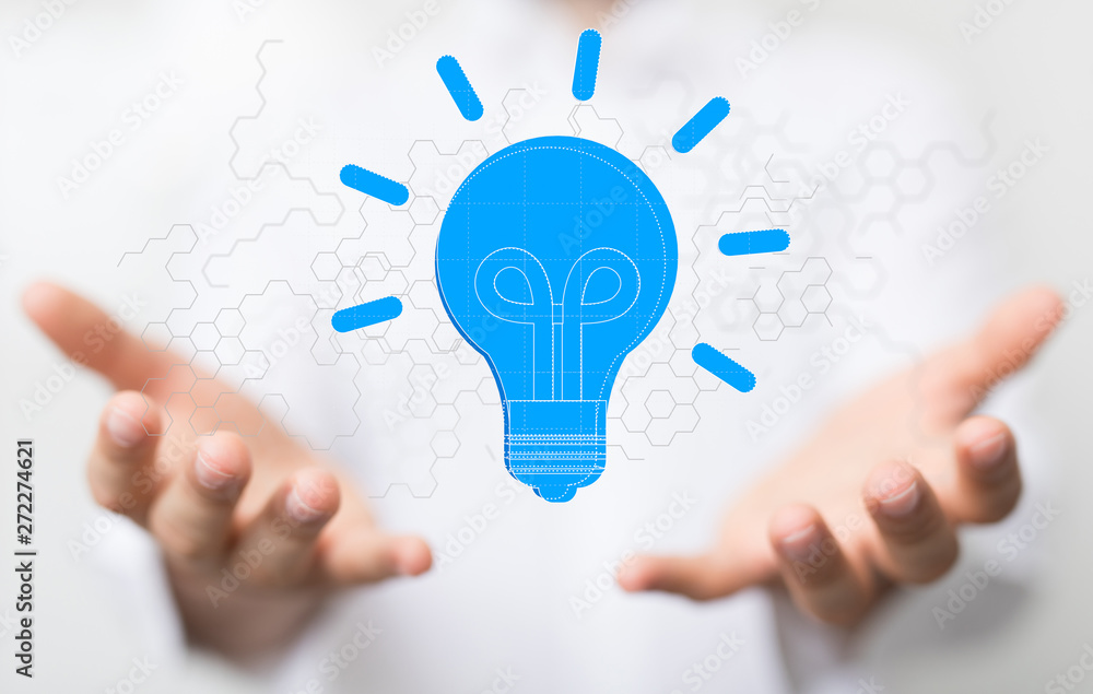 holding illuminated light bulb, idea, innovation and inspiration concept. holding illuminated light bulb, idea, innovation and inspiration concept.