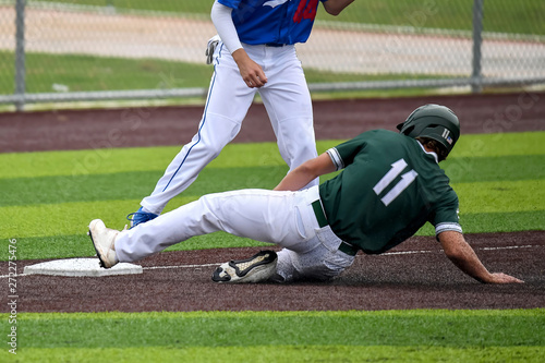 Photography Young athletic boys playing baseball