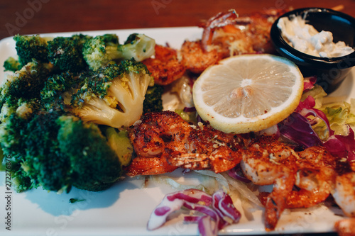 Grilled prawns with broccoli and lemon