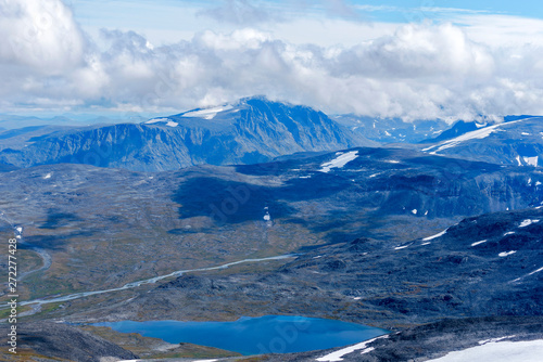 The Valley of Sjoa river and Steinbuvatnet lake as seen from Glittertind mountain. Lom, Norway photo