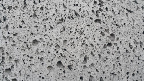 Grey color floor background with drak grey hole shapes