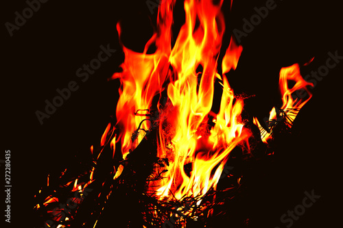Fire flames on abstract black background
