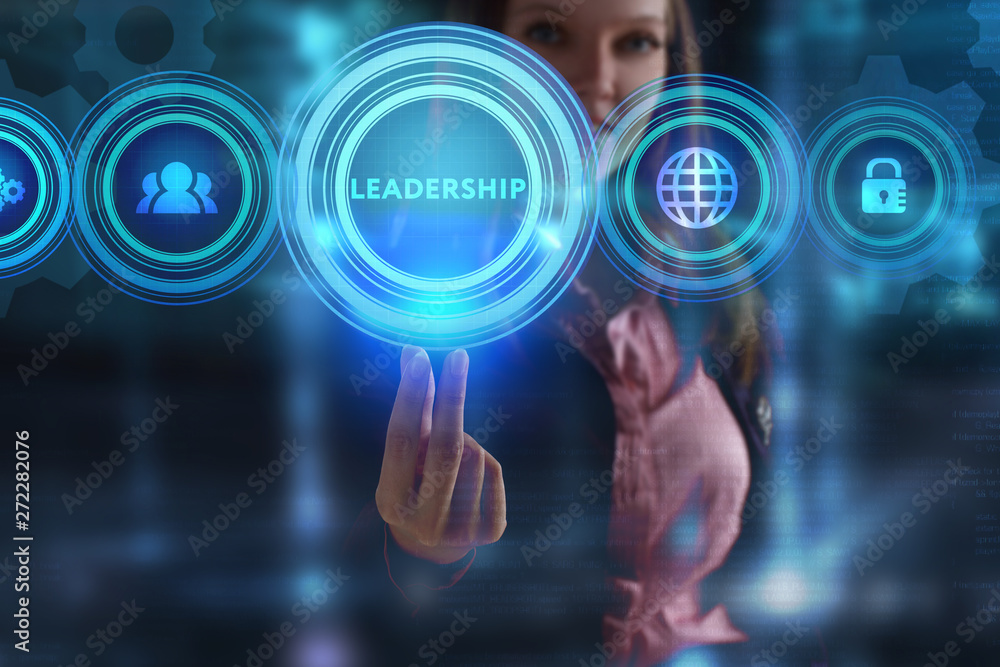 The concept of business, technology, the Internet and the network. A young entrepreneur working on a virtual screen of the future and sees the inscription: Leadership