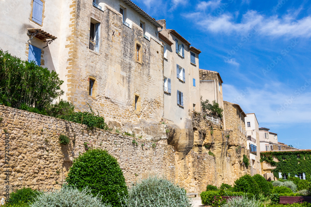 Lauris, France. 06-05-2019. Old houses and garden at  Lauris village in Provence, France.
