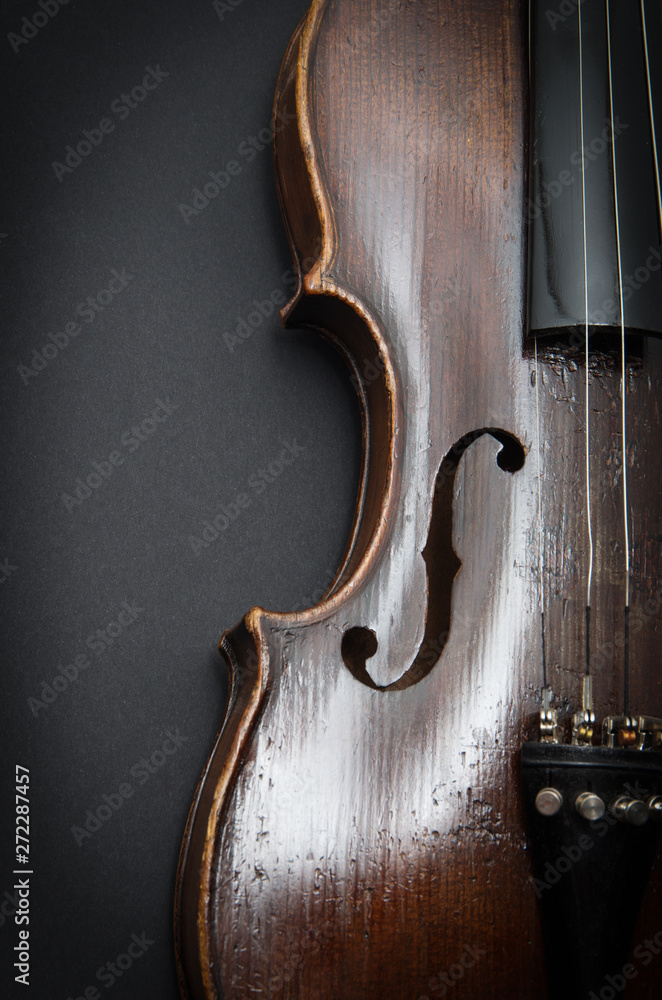 Violin music instrument of orchestra closeup isolated on black Violin music instrument of orchestra closeup isolated on black