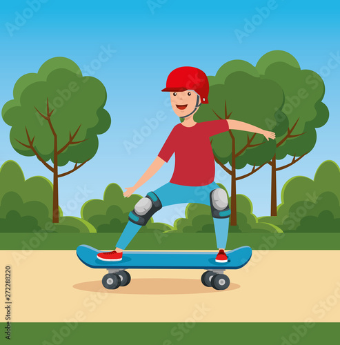 boy playing skateboard with helmet in the park