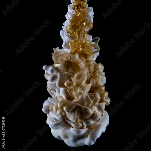 white and gold ink in water