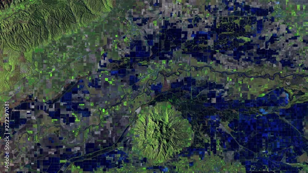 Satellite view aerial sunrise on green and blue cultivated fields of rice in Sacramento valley, California. Contains public domain images by Nasa Satellite view aerial sunrise on green and blue cultivated fields of rice in Sacramento valley, California. Contains public domain images by Nasa