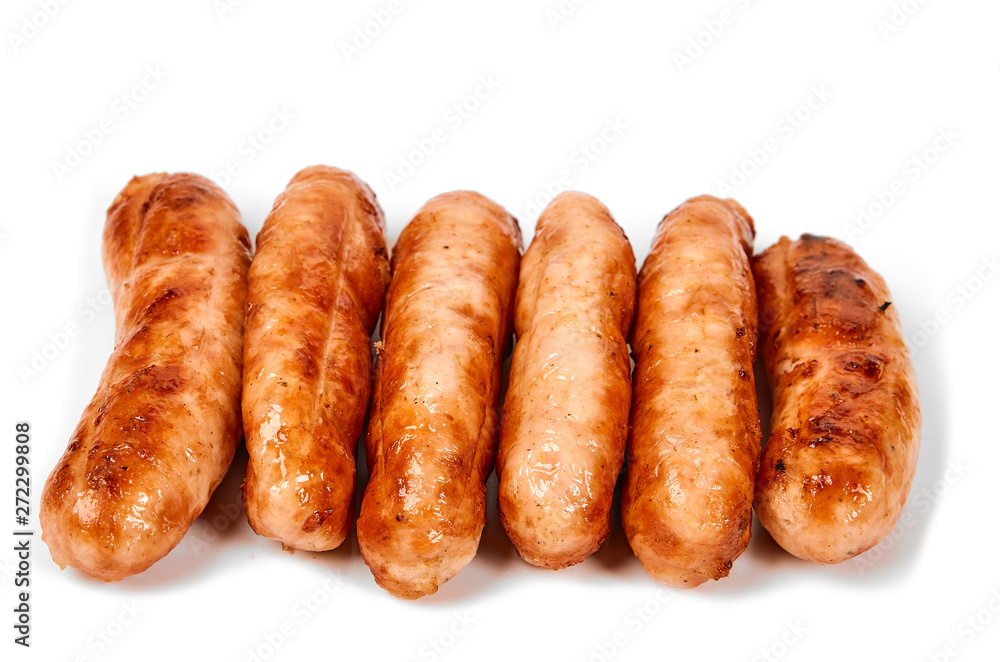 Meat sausages with glitter on a light background. Fried sausage. The concept of traditional cuisine. Meat sausages with glitter on a light background. Fried sausage. The concept of traditional cuisine.
