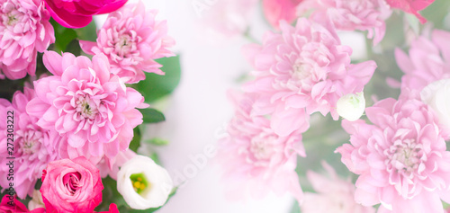 Festive delicate floral background. Fresh bouquet of flowers on a gentle white background