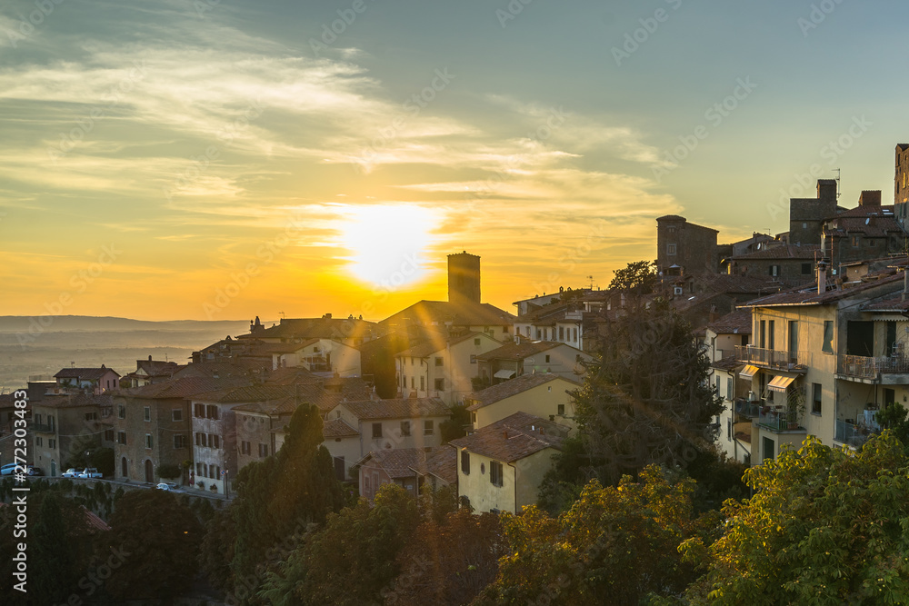 A scenic sunset over Cortona, a beautiful medieval town in Arezzo province, Tuscany, Italy