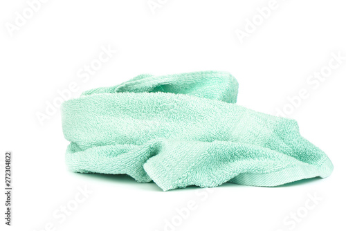 Light green terry towel isolated on white background.