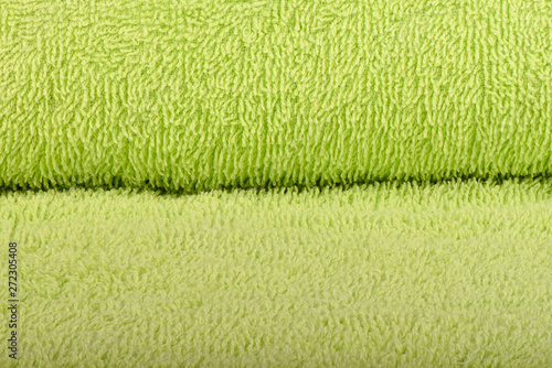 Green terry towel. The texture of the cloth towels.