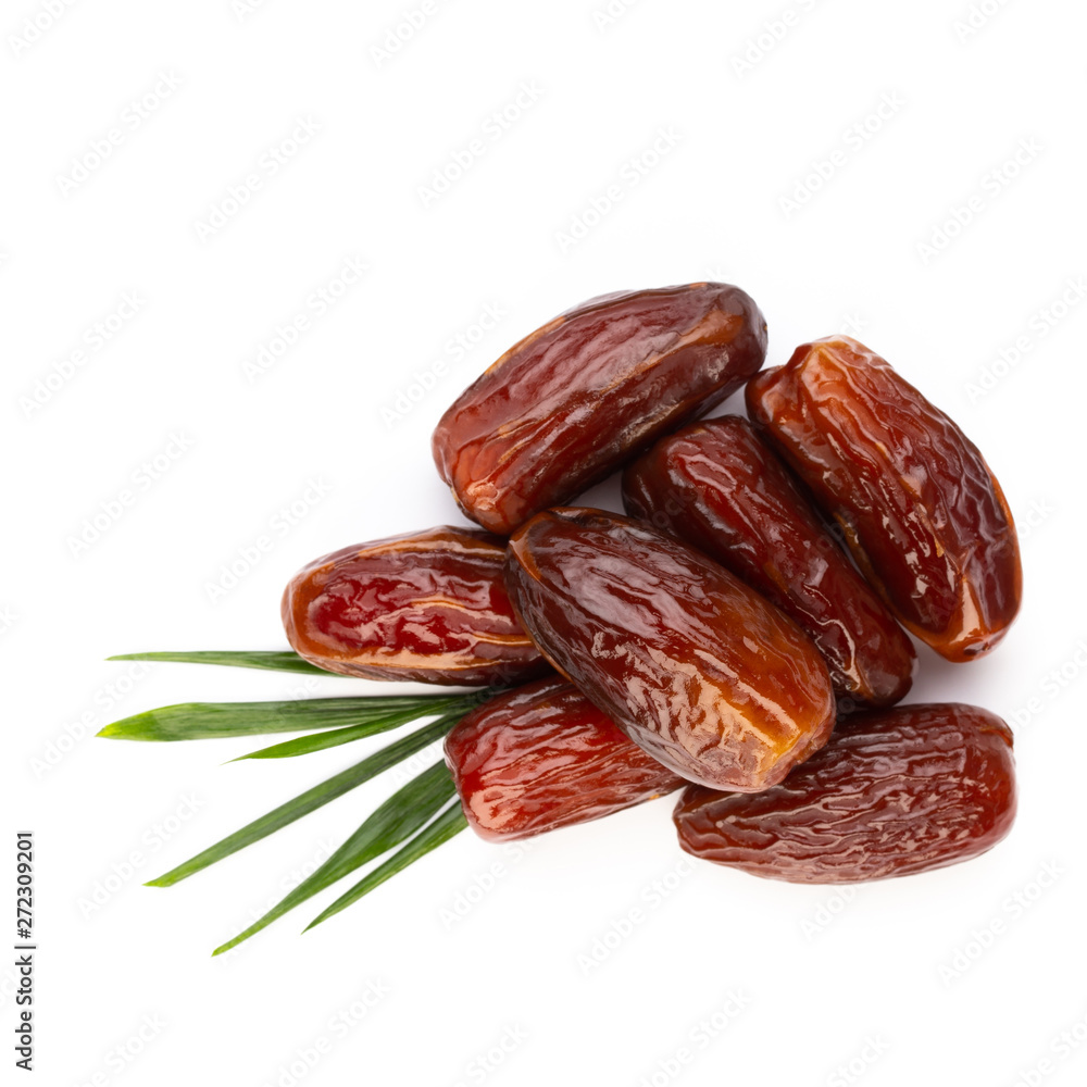 Dry dates isolated on white background. Top view. Flat lay pattern. Dry dates isolated on white background. Top view. Flat lay pattern.