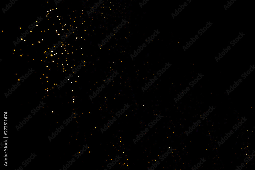 Gold abstract bokeh. Black background. Holyday concept Gold abstract bokeh. Black background. Holyday concept