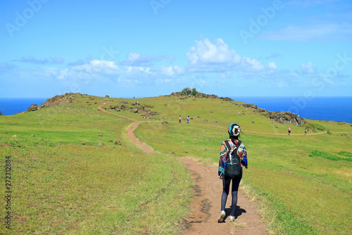 Female Tourist Visiting Orongo Village, the Historic Ceremonial Center on Easter Island, Chile