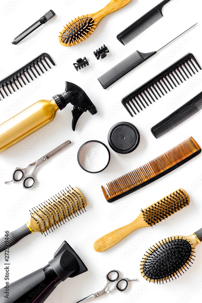 Set of professional hairdresser tools with combs and styling on white background top view pattern Set of professional hairdresser tools with combs and styling on white background top view pattern