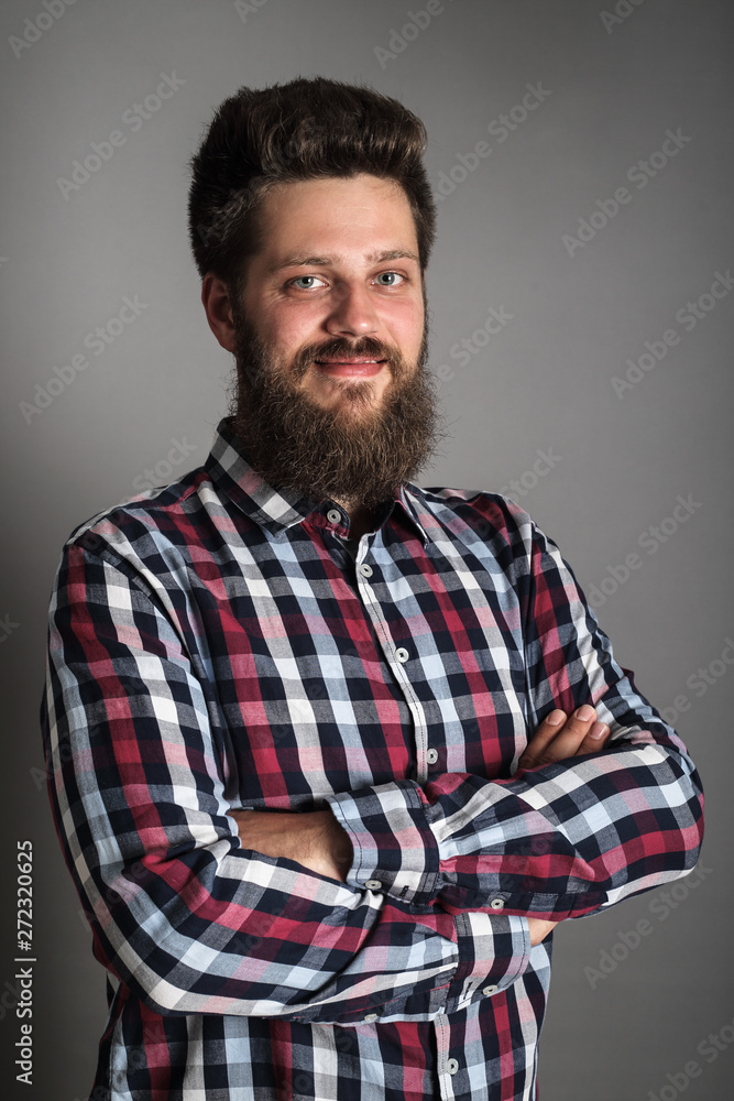 Smiling man in checked shirt Smiling man in checked shirt