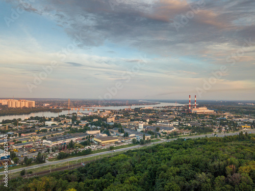 Aerial view of Kyiv from the sky. Sunset over summer Kyiv. Filmed on drone