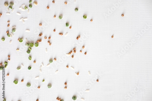 Pattern with buckwheat, wheat, peas and rice on a white background. Pattern with porridge for food
