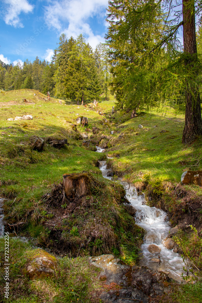 Panorama of untouched landscapes in the Austrian Alps with river, streams and waterfalls Panorama of untouched landscapes in the Austrian Alps with river, streams and waterfalls