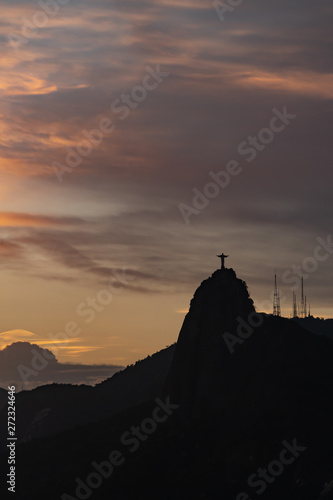 silhouette Christ the Redeemer on top of the mountain