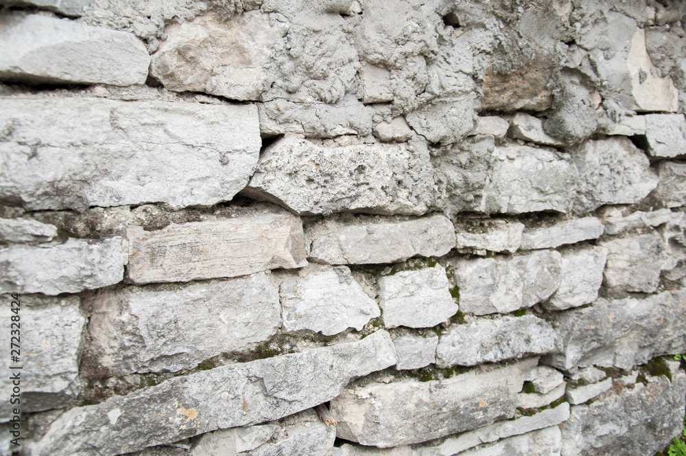 wall of large stones. The texture of the stone.