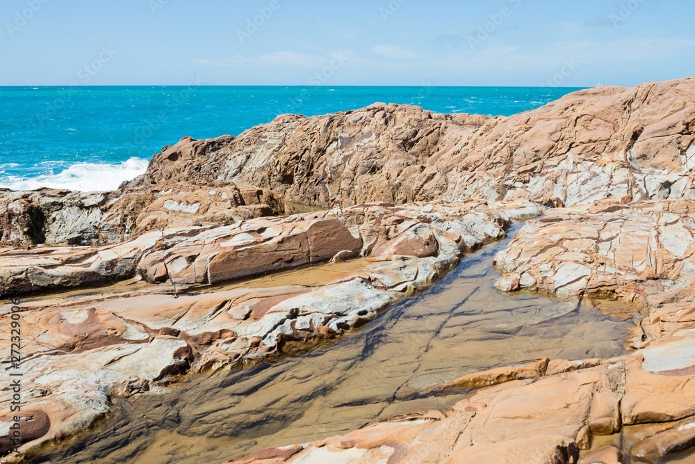 Beautiful azure sea and sandstones beach