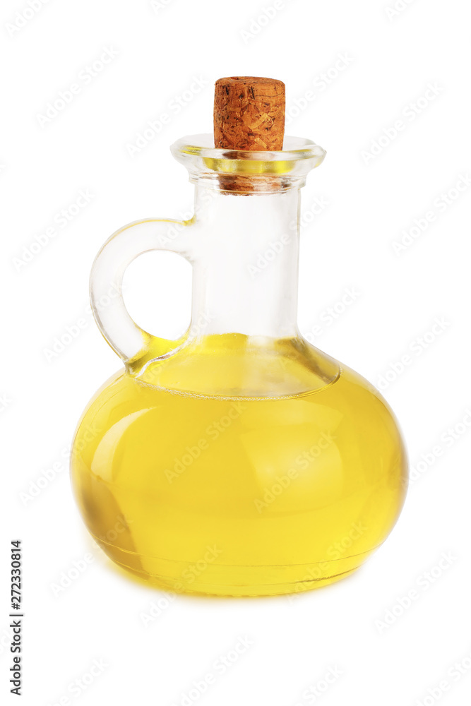 A glass bottle with oil isolated on a white background A glass bottle with oil isolated on a white background