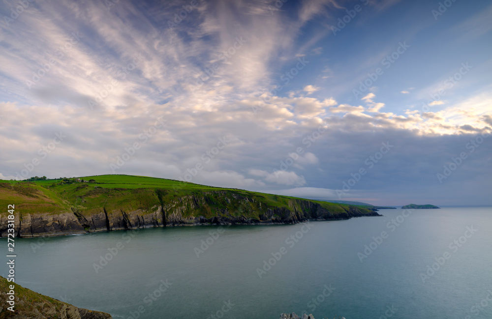 Evening light on the Ceredigion cliffs and Cardigan Island from Mwnt, Wales