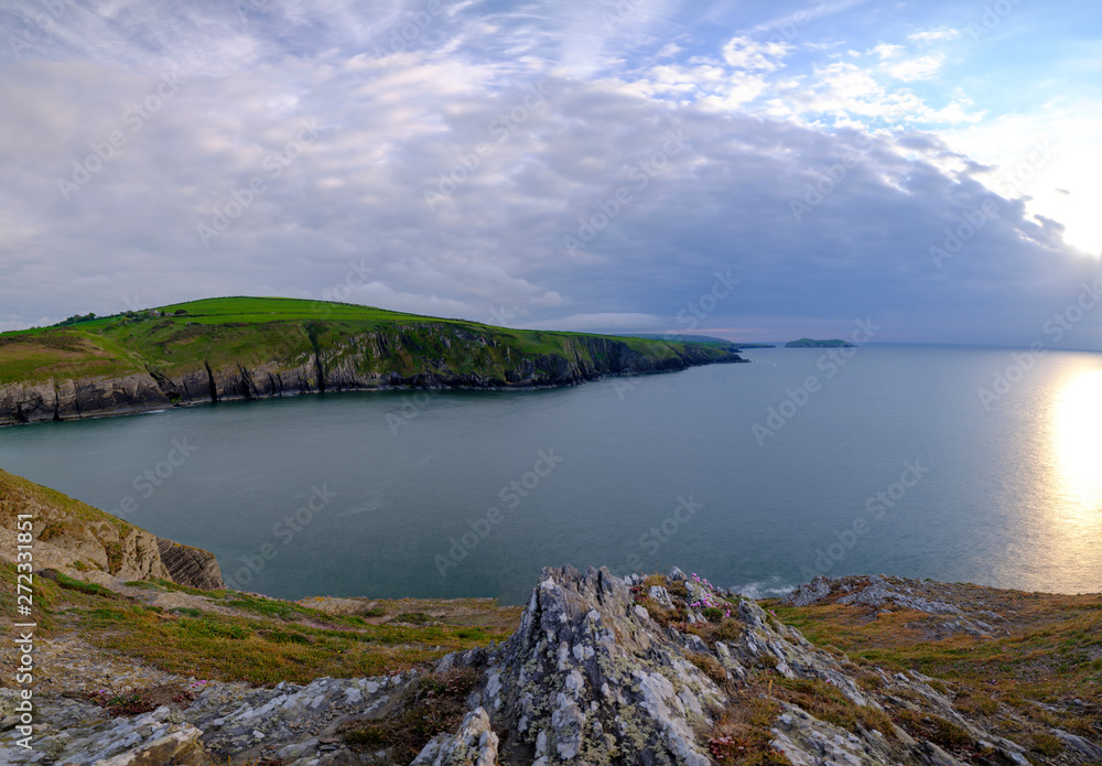 Evening light on the Ceredigion cliffs and Cardigan Island from Mwnt, Wales