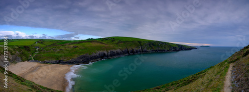 Evening light on the Ceredigion cliffs and Cardigan Island from Mwnt, Wales