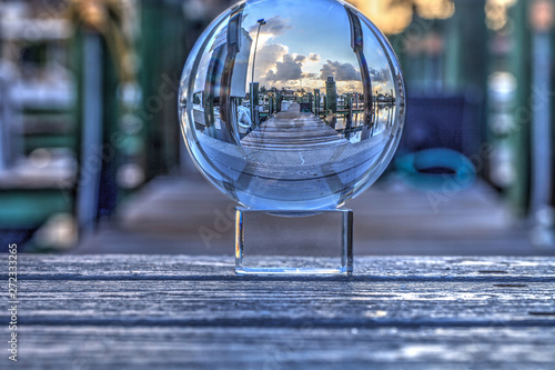 Crystal ball of Boats docked at a Marina near Venetian Bay photo