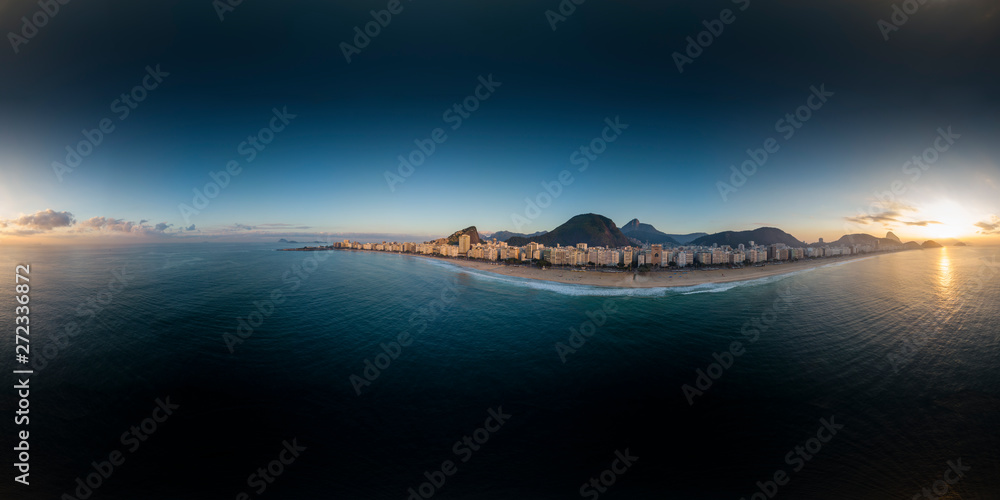 360 degree aerial panorama of Copacabana beach and neighbourhood in Rio de Janeiro at sunrise with the Corcovado mountain in the background ready for use in 3D environment mapping and 360VR