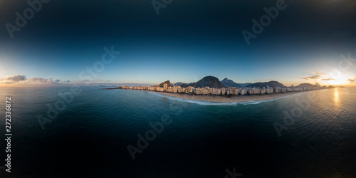 360 degree aerial panorama of Copacabana beach and neighbourhood in Rio de Janeiro at sunrise with the Corcovado mountain in the background ready for use in 3D environment mapping and 360VR