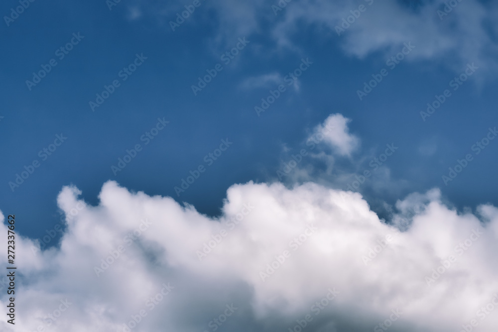 Blue sky background with white clouds. Beautiful nature wallpaper for background Blue sky background with white clouds. Beautiful nature wallpaper for background
