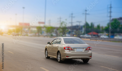 Car Driving on High Way Road And Blue Sky Background © Suriyo